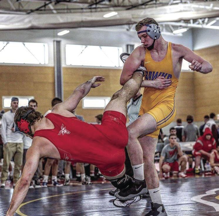 Junior Connor Humphries attempts to take down his opponent.