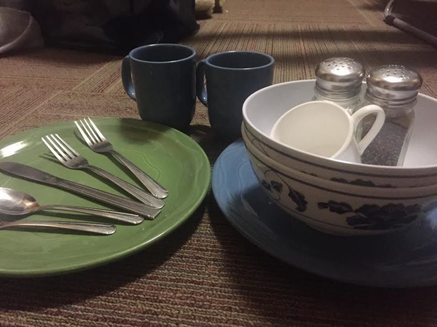 Dishware and utensils that some freshmen students have accumulated from Commons so far this year.