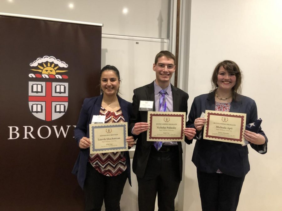 (From left to right) Tatevik Khachatryan, Nicholas Polinsky and Michaela Aptt pose with their awards at the Brown University Crisis Simulation.