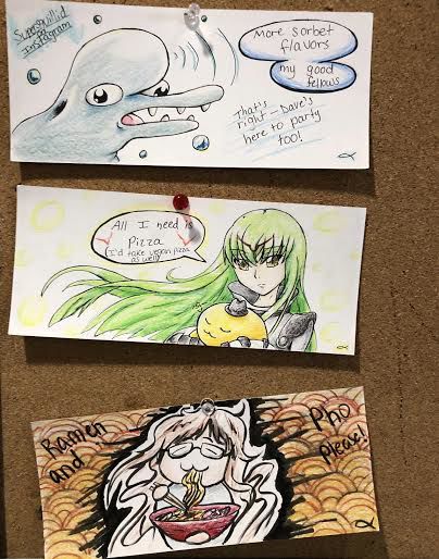 Amelia Bianchi’s cartoon drawings are hanging on the Commons suggestions board, each requesting different food items.