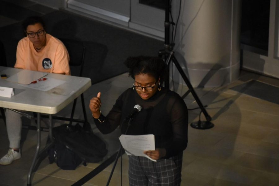 Suffrard performs Happy Anniversary at the RWU Poetry Slam