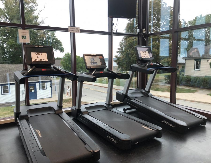 Students cannot use cardio machines directly next to each other in RWU’s Fitness Center. Certain machines are blocked off to maintain appropriate distance between gym-goers.