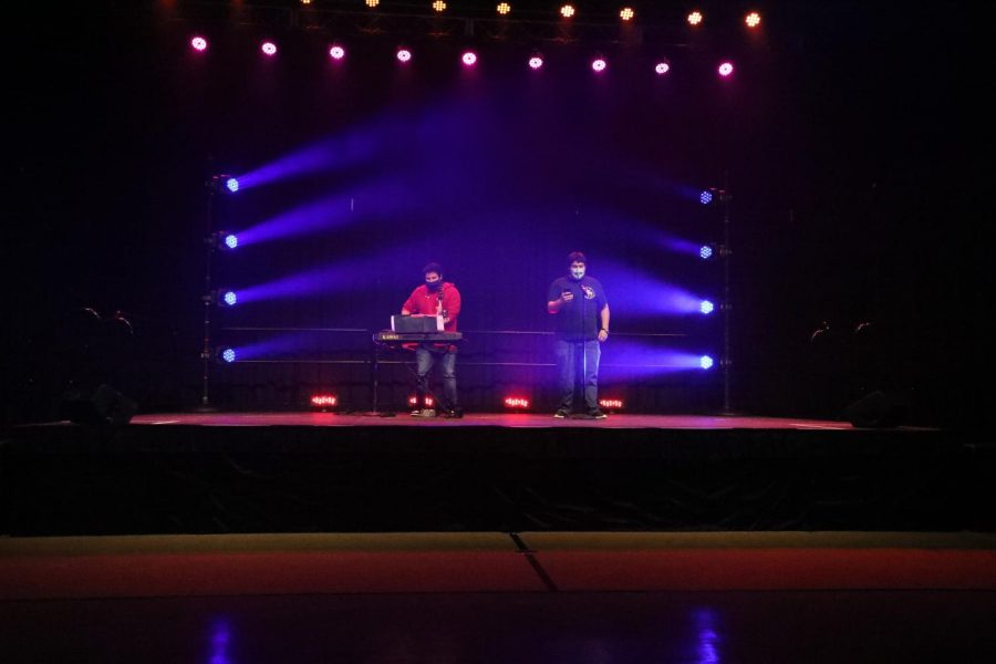 Adam Zerman played the piano and guitar while Joe Brown sang during their performance at the Rogers Miracle Network Talent Show. 