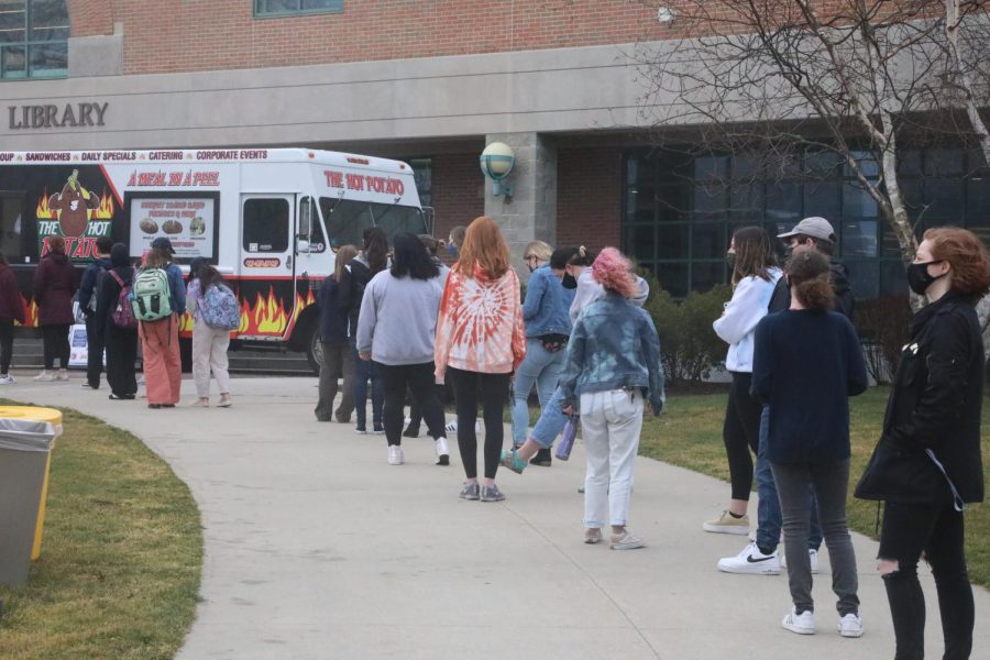 Students waited for their free potato from The Hot Potato food truck. 