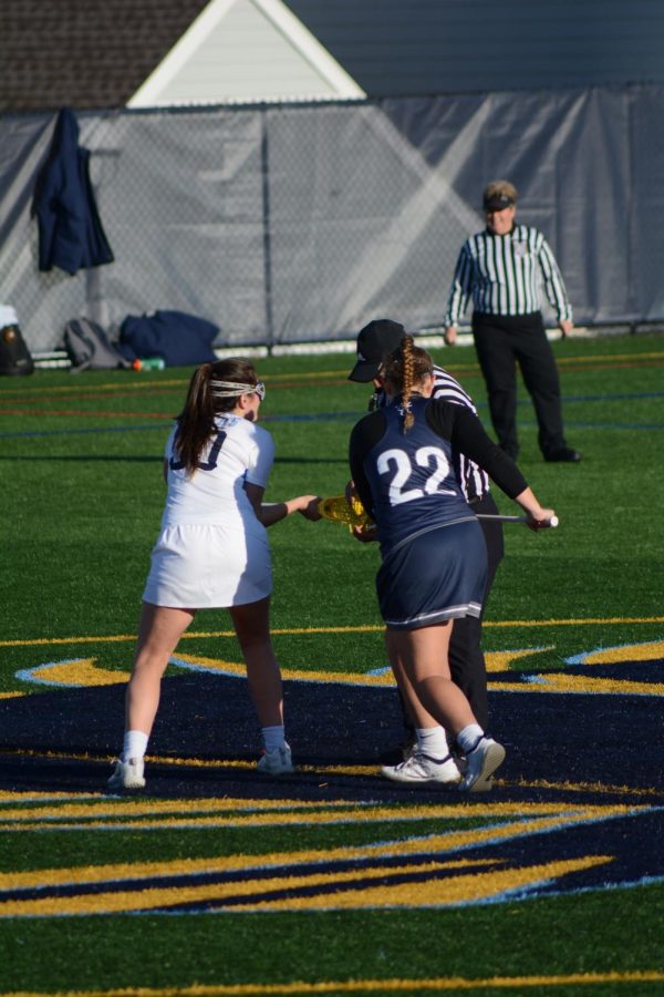 Ryleigh+Cavanaugh+%28left%29+faces-off+against+a+Gordon+Colleges+Hailey+Beling+%28right%29+in+the+Womens+Lacrosse+dominating+game+on+Friday