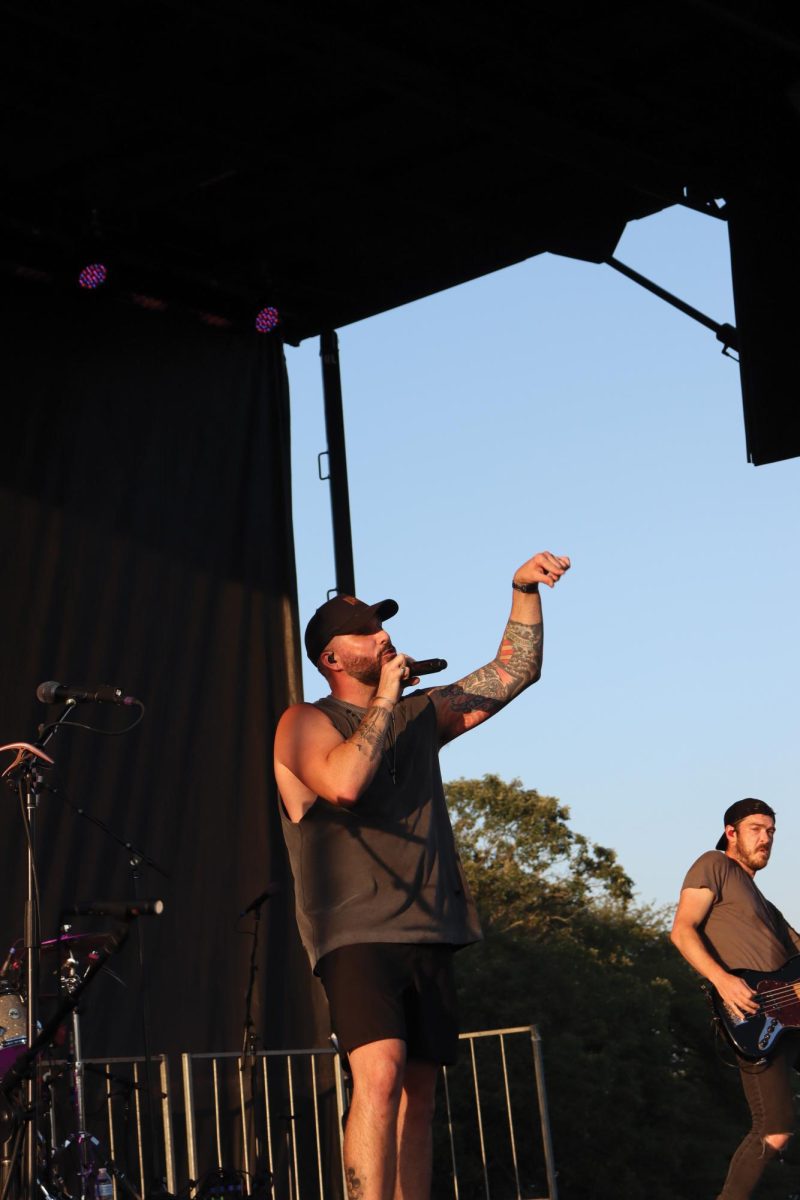 Singer Tyler Rich performing onstage during 1, 2, 3 Weekend.