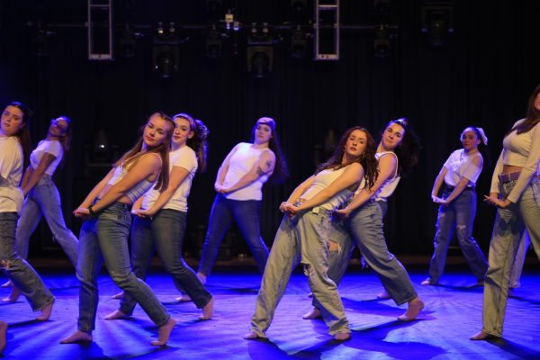 Dance Club performs onstage for their spring semester show.