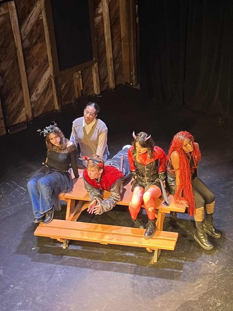 StageCo actors on stage during a performance of "She Kills Monsters" 