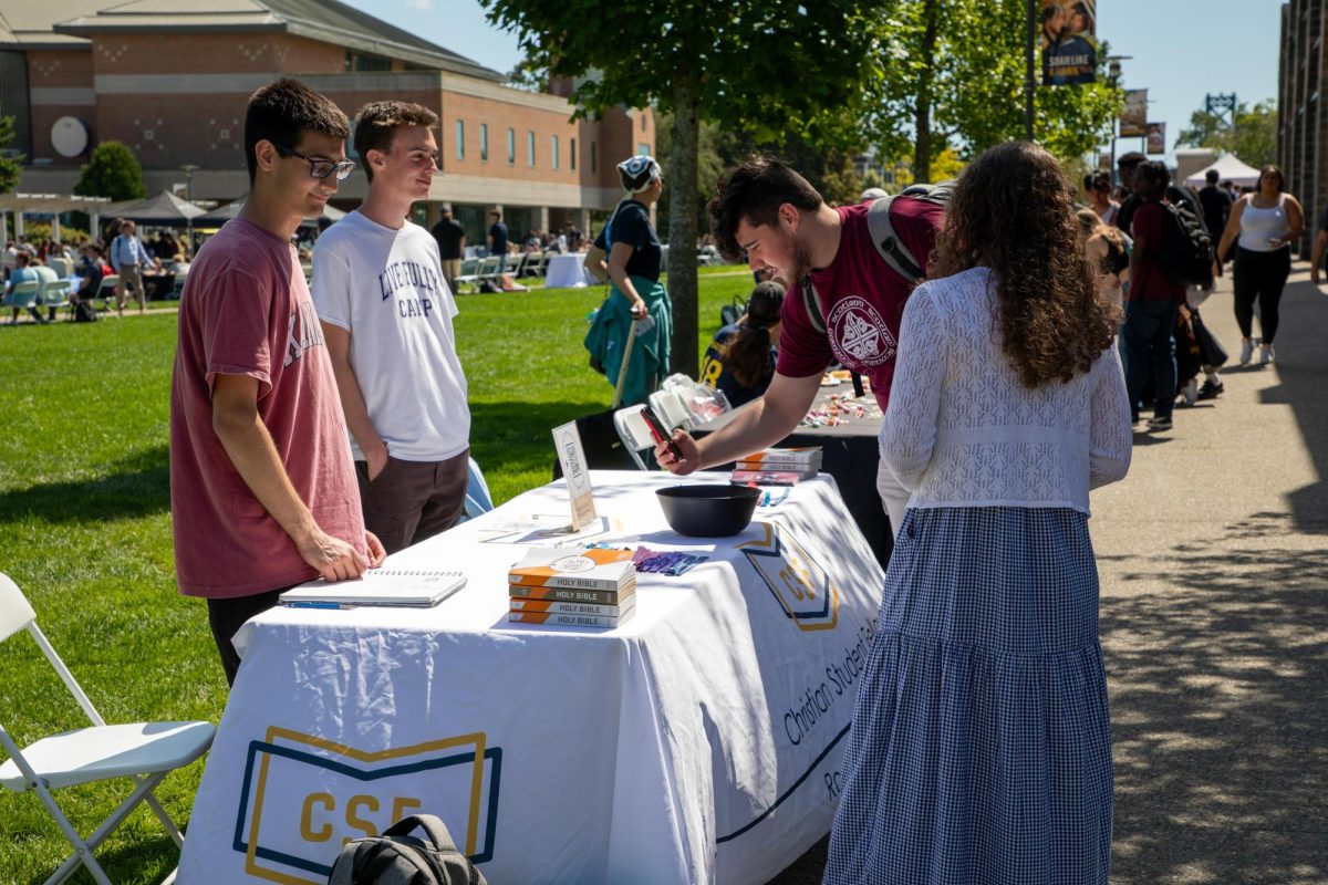 Christian Student Fellowship's table at the involvement fair.