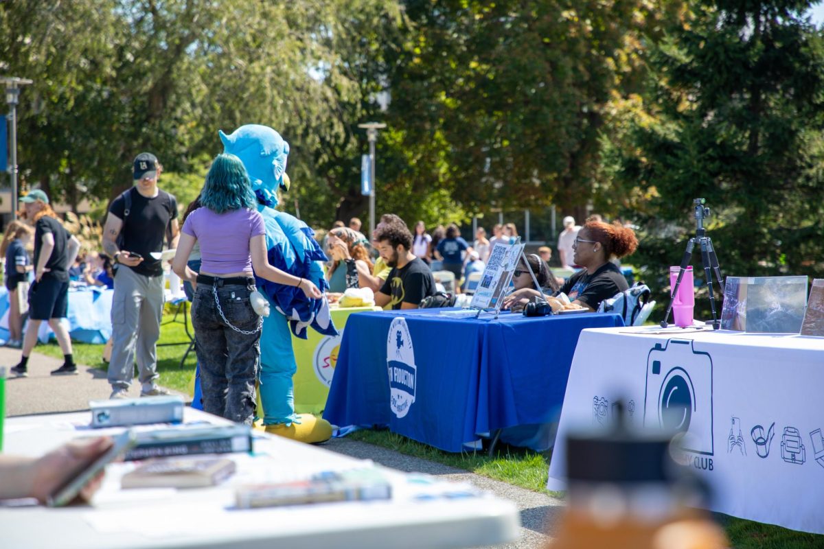 Swoop visiting the Film Club's table at the involvement fair.