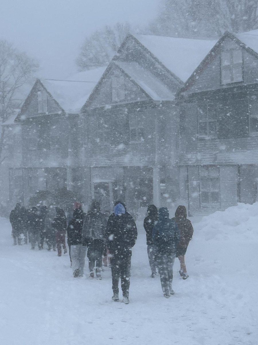 Residents line up outside the Center for Student Development. 